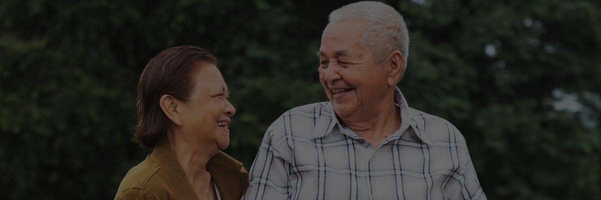 elderly couple walking together in adult diapers