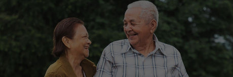 elderly couple walking together in adult diapers